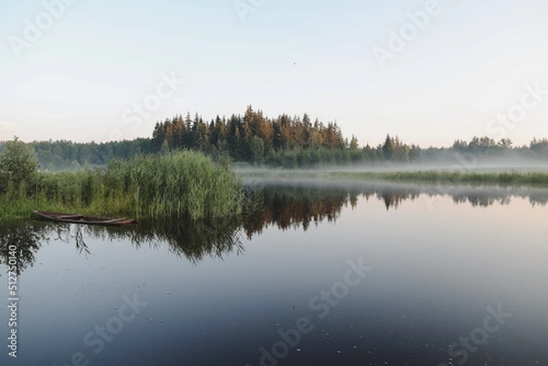 Obraz summer evening twilight view on picturesque plain lake surface with reflections of sky and trees