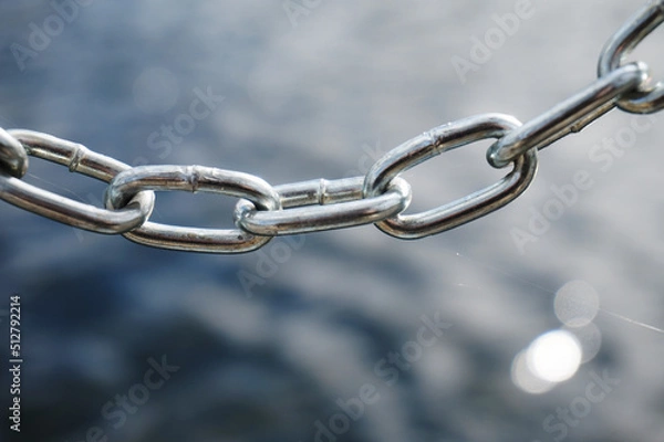 Obraz Silver metal chain, defocused background