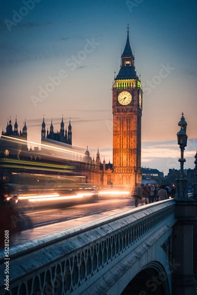 Fototapeta Big Ben at Dusk, London. An early evening view over Westminster Bridge and Big Ben. Long exposure with intentional motion blur of passing traffic.