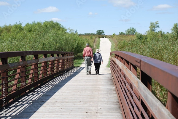 Obraz Two people enjoying walking in James Pate Philip State Park, Bartlett, Illinois, USA.