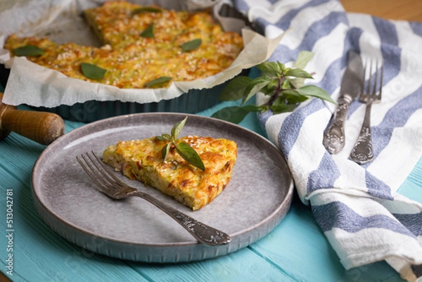 Fototapeta zucchini pie with ham and cheese