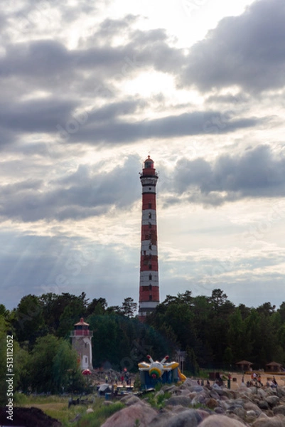 Fototapeta Old lighthouse with dramatic light
