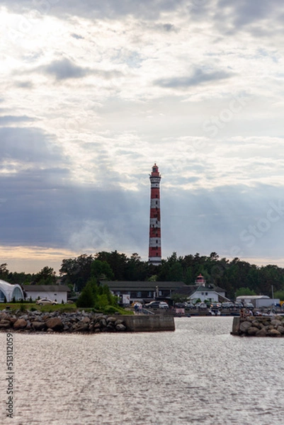 Fototapeta Old lighthouse with dramatic light
