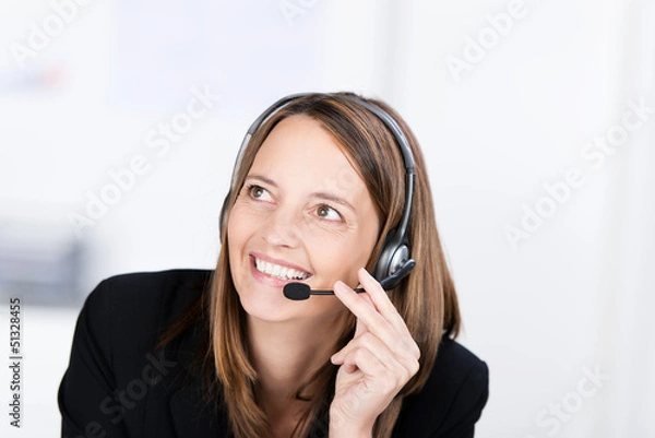 Fototapeta geschäftsfrau telefoniert mit headset