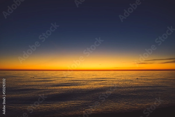 Fototapeta sunset over the sea