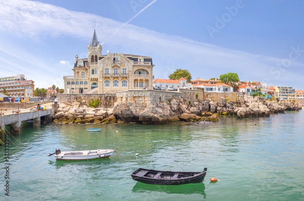 Obraz Cascais near Lisbon, seaside town. The house in the center is the Seixas Palace, built on the ocean at the beginning of the 20th century. Portugal