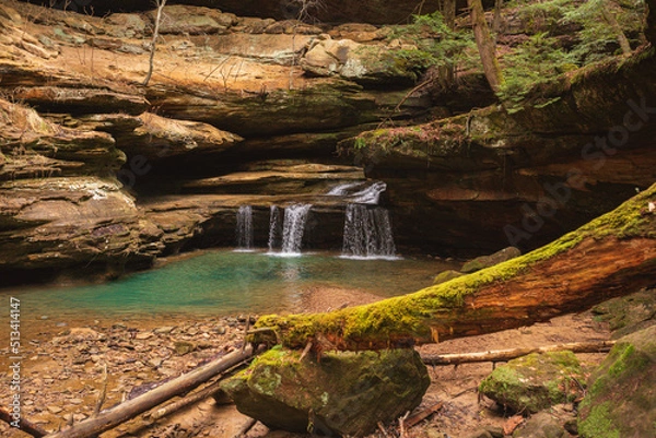 Obraz Pristine waterfall flowing through stone cliffs in Hocking Hills State Park, Ohio. 