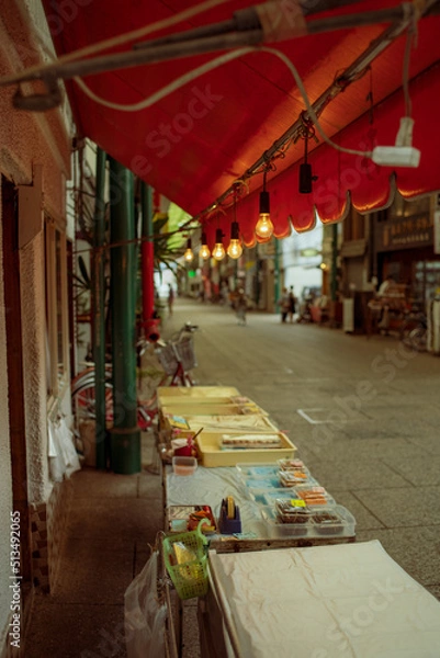 Obraz 軒先での商売