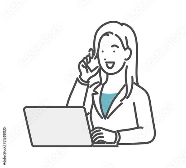 Obraz パソコンを見ながら電話する女性