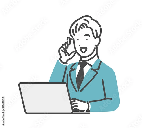 Obraz パソコンを見ながら電話する男性