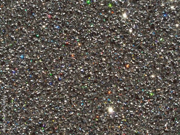 Fototapeta Luxurious Festive sparkling abstract background.  A festive holiday card. Macro sparkling silver black abstract background
