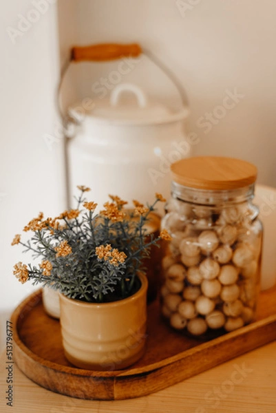Fototapeta Dry herbs and nuts in the jar