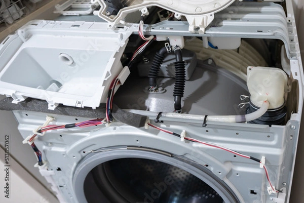 Fototapeta 故障したドラム式洗濯機の修理点検工事
