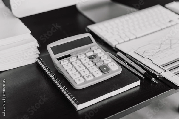 Fototapeta Nobody, Office supply on desk table with analysis chart, computer, notebook, pen,calculator on desk, Business concept.