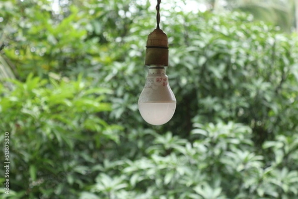 Obraz An LED bulb hanging