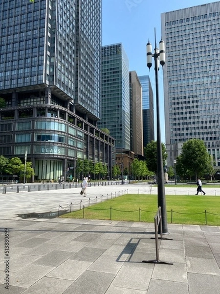 Fototapeta Tokyo station Marunouchi new modern look of the city with its architecture and street lights.  Year 2022 June 19th