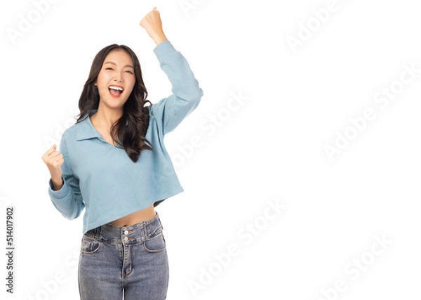 Obraz Excited young asian woman with raised hands celebrating success Portrait cheerful positive asian female with raised hands and fists open mouth Girl get happy, enjoy life isolated on white copy space
