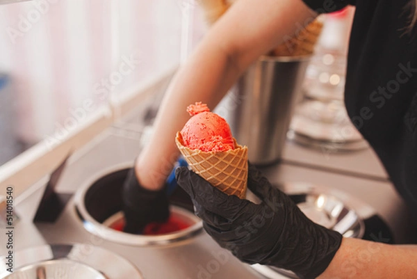 Obraz Process of making ice cream. Professional ice cream dessert making in cafeteria. Ice cream equipment.