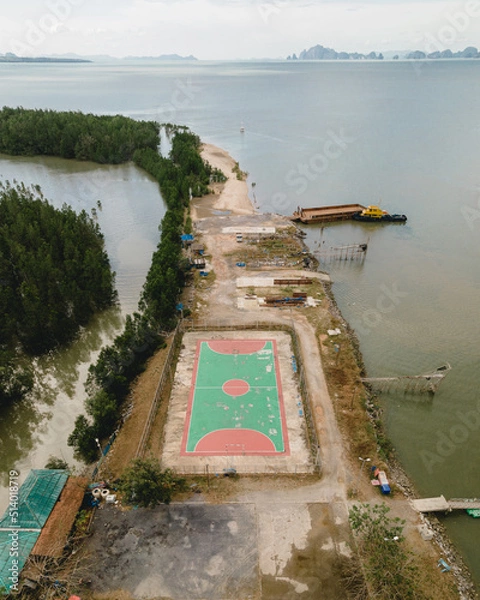 Obraz Aerial view of a football field in the mangrove jungle
