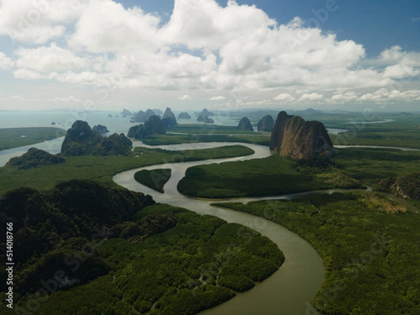 Obraz Aerial view of a swerving river through a series of limestones in Phang Nga Bay