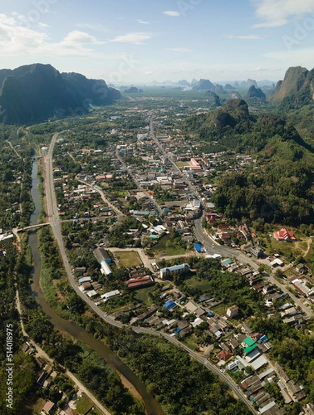 Obraz Aerial view of the town of Phang Nga tucked in between limestones