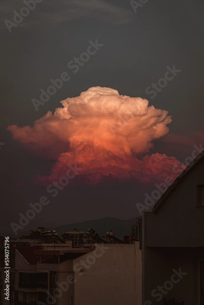 Obraz Cloud and sunset in the city