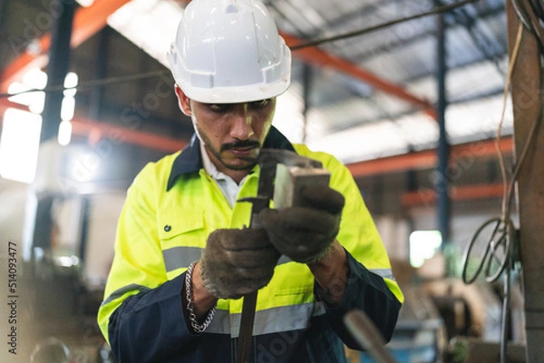 Fototapeta professional technician engineer working to control electrical power and safety service system, electrician working to maintenance and checking industrial equipment in term of factory technology