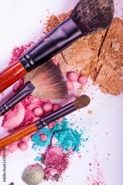 Fototapeta close up of a make up accessories-powder, eyeshadows, lipstick 