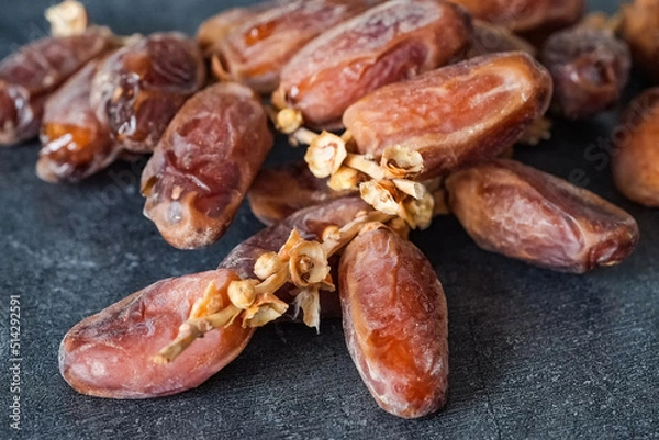 Fototapeta Dried dates, selective focus.