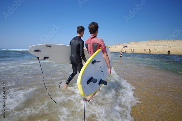 Obraz surfeurs à l'océan