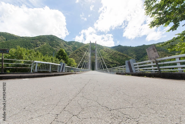 Obraz bridge with mountains and sky