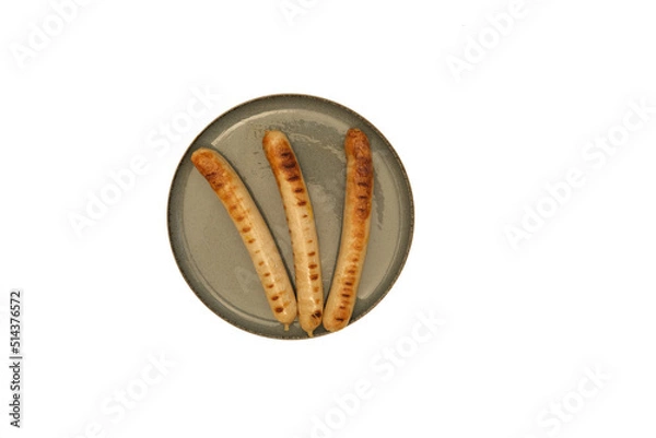 Fototapeta Grilled sausages for grilling in a pan. Isolated on white background