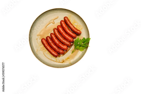 Fototapeta Grilled sausages for grilling in a pan. Isolated on white background