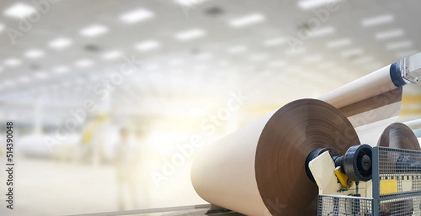 Fototapeta Big paper roll in production factory background.