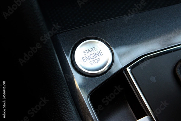 Fototapeta Silver start and stop button in a vehicle. Automatic car. Engine start button.