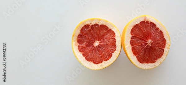 Obraz fresh grapefruit close-up on white background