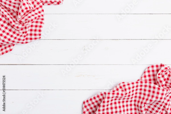 Fototapeta Flat lay cotton with copy space for text menu to restaurants. Top view of fabric tablecloth red and white on wooden white table.
