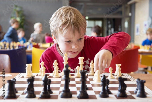Obraz Young chess player at a tournament