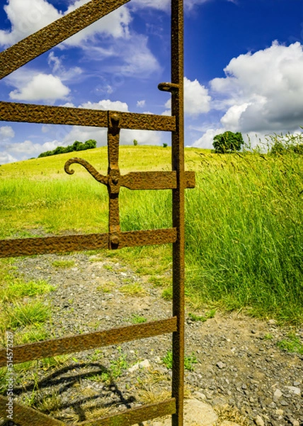 Fototapeta Farm gate with landscape beyond