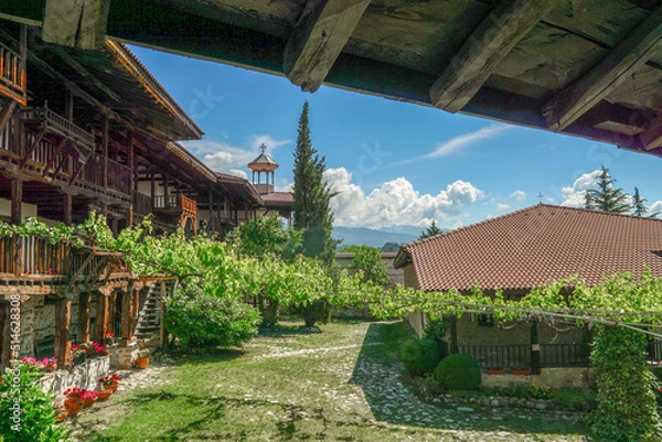 Fototapeta 04_Courtyard fragment of medieval monastery "Nativity of the Virgin Mary"  near the village of Rozhen in the Pirin Mountains, Bulgaria.