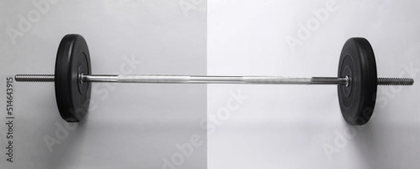 Fototapeta Barbell on a gray-white background. Bodybuilding and fitness. Top view
