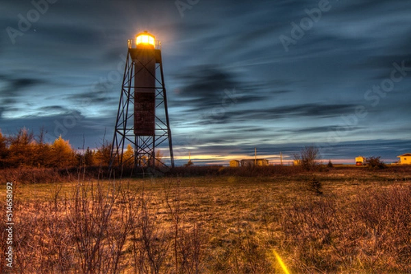 Fototapeta lighthouse with cloudy long exposure