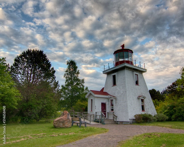 Fototapeta lighthouse with trees