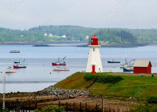 Fototapeta lighthouse with boats