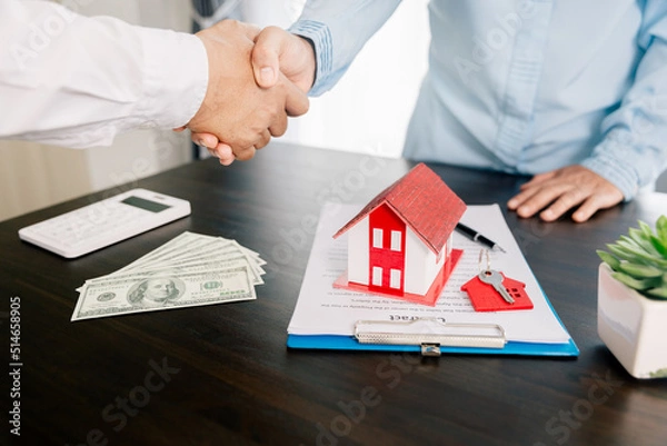 Obraz Real estate brokers or real estate agent with client or architect team Discussions about contracts , Saving money to invest in house or property in the future. Business property Concept.