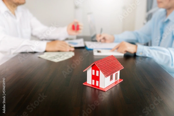 Obraz Real estate brokers or real estate agent with client or architect team Discussions about contracts , Saving money to invest in house or property in the future. Business property Concept.