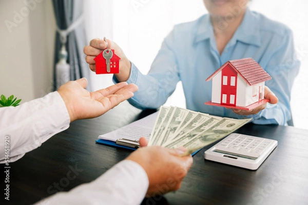 Obraz Real estate brokers or real estate agent with client or architect team Discussions about contracts , Saving money to invest in house or property in the future. Business property Concept.