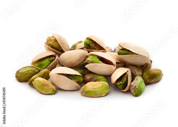 Obraz Pistachio nuts. Many pistachios isolated on white.