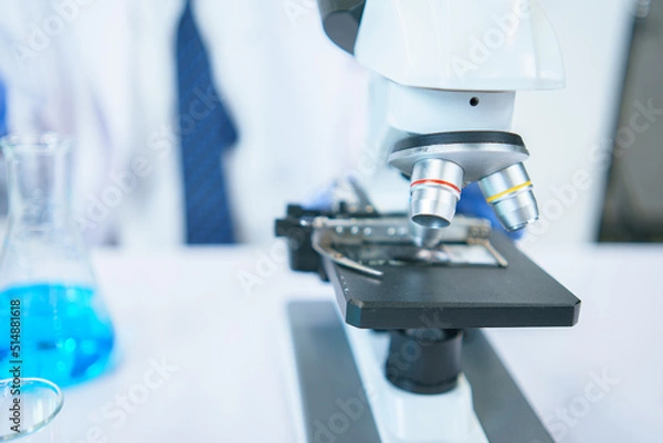 Fototapeta Asian scientists are seriously studying the chemical composition in the laboratory. Specializing in Young Biotechnology Use advanced microscope equipment.