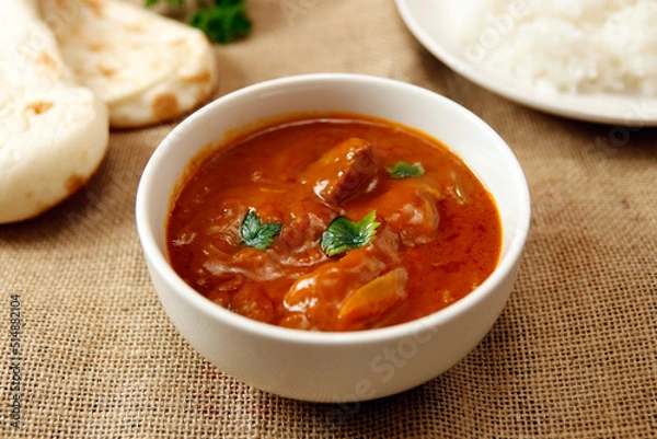 Obraz Indian chicken curry roux like tomato soup on the table